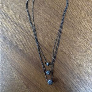 Three layered black metal and beaded necklace